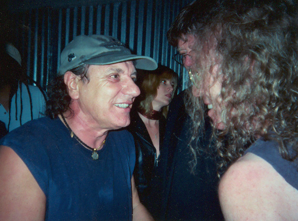 Brian Johnson with Waddy Wachtel backstage at The Joint after performing with the Waddy Wachtel Band in 2004